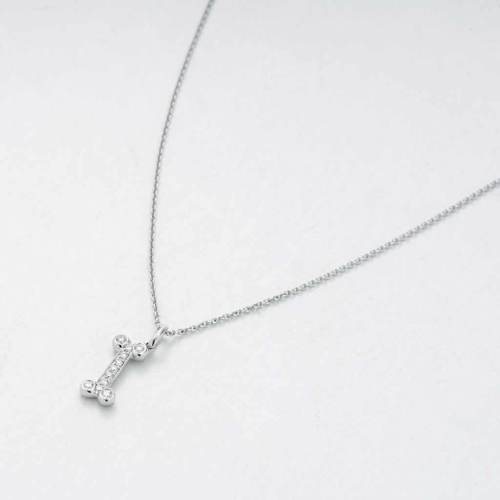 Petite Diamond Bone Shape Pendant In White Gold 