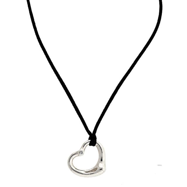 Return to Tiffany™ mini double heart tag pendant in silver with Tiffany  Blue enamel finish. | Tiffany & Co.