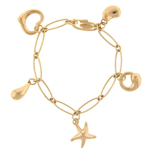 Tiffany and Co. Atlas Collection 18 Karat Yellow Gold Charm Bracelet at  1stDibs | tiffany gold charm bracelet, tiffany and co charm bracelet gold, gold  charm bracelet tiffany